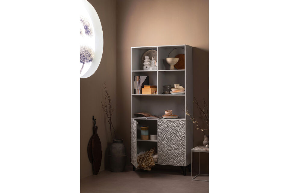 Eye-catching storage: Carved Characterised by graphic designs Finished in a neutral colour shade H