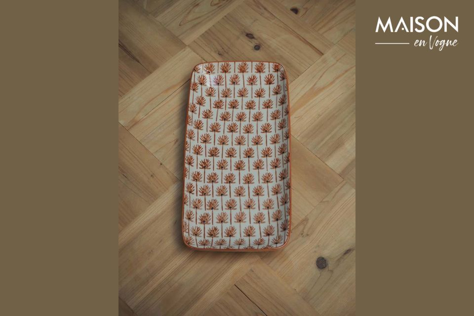 Ces 4 jolis petits plats de 30 cm de long sont en céramique blanche décorée