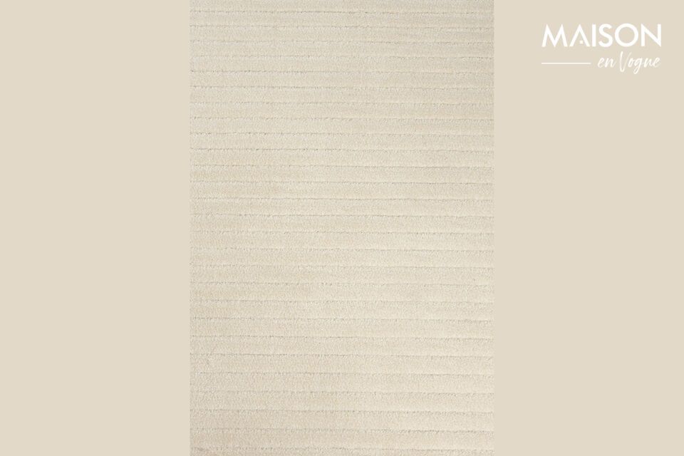 Elegancia y confort con la alfombra de tela beige.
