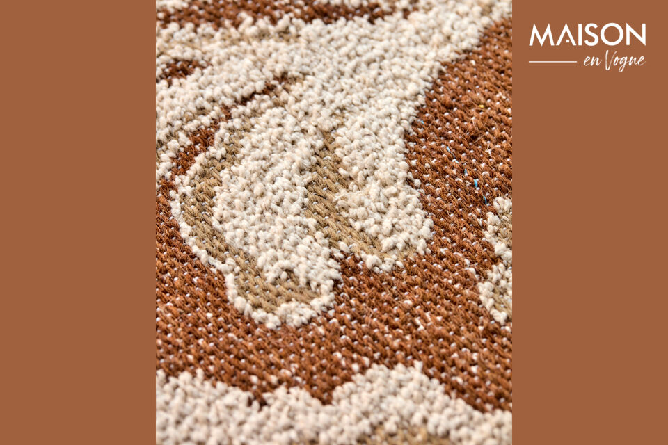 This handmade rug in warm brown tones brings timeless style and subtle femininity to your home
