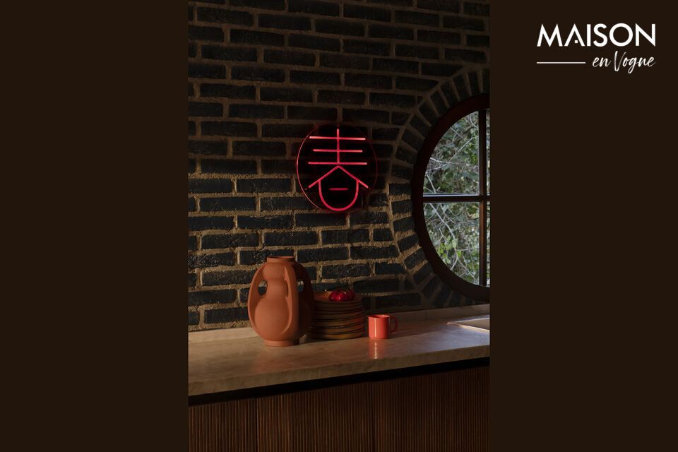 Le symbole est composé d’une lumière LED rouge dont l’intensité est réglable