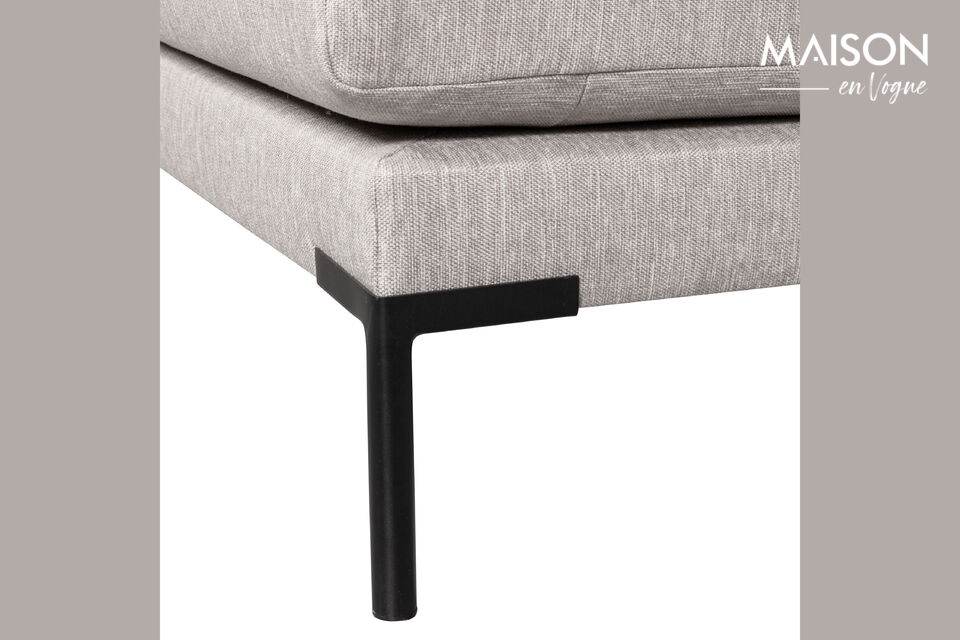 Les coussins confortables sont recouverts d\'un tissu chiné tissé qui est également très