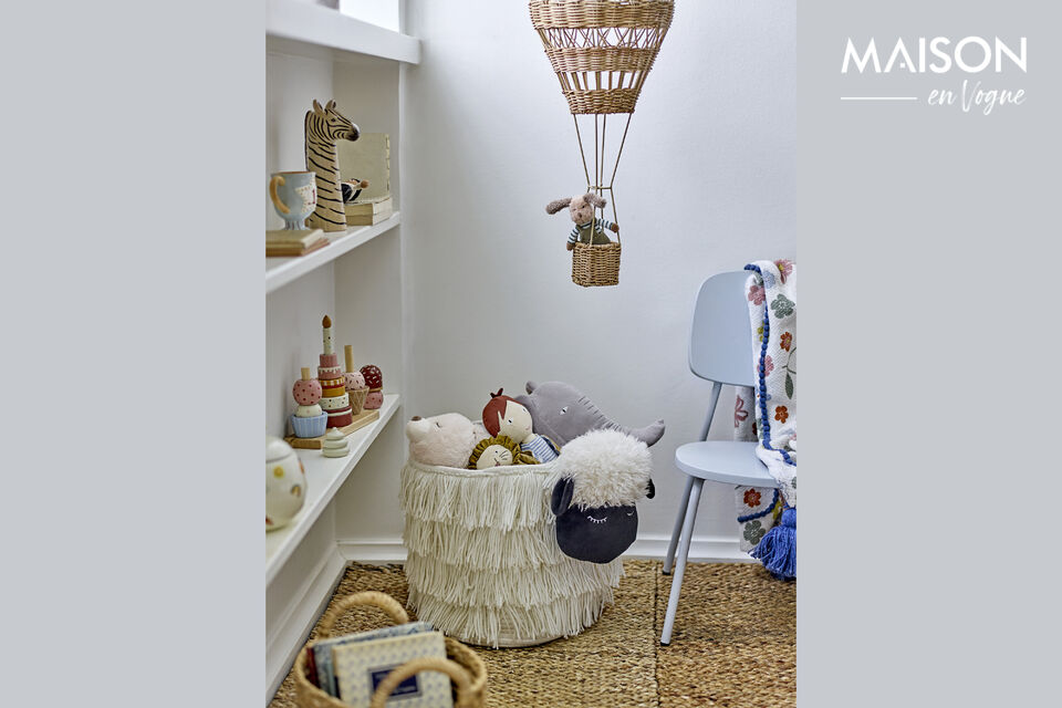 The Dolly Basket by Bloomingville MINI resembles a sheep and is made of soft white polyester with