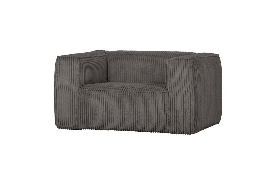 It is characterized by a wide ribbed fabric covering that emphasizes its simple lines