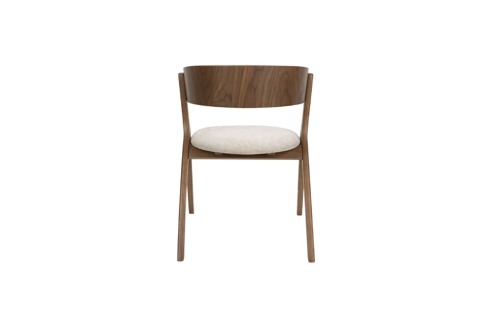The curved backrest is attached between the arms with black screws, adding that typical retro touch
