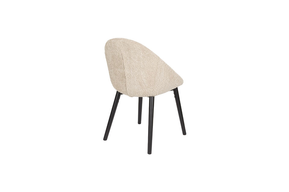 With its wooden legs and bouclé-covered bucket seat