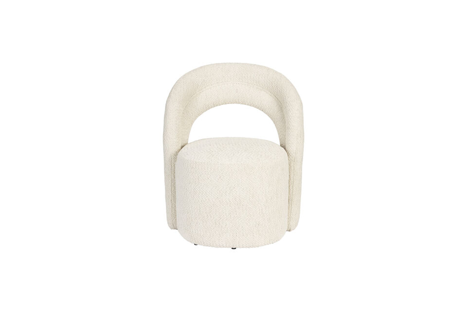 What immediately stands out is the rainbow-shaped backrest, which seems to hug the round seat