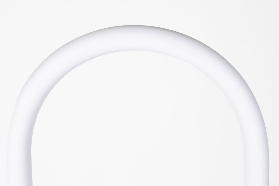  
Sturdy metal base with an elegant acrylic arch