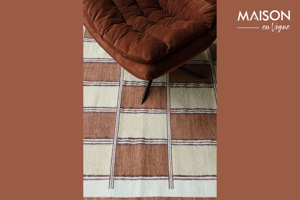 Deze vloerkleden en sierkussens vullen de ruimte namelijk direct met een vrolijke en retro sfeer