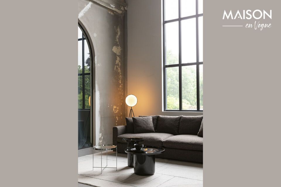 Its deep color and glossy finish blend harmoniously with a variety of decorative elements