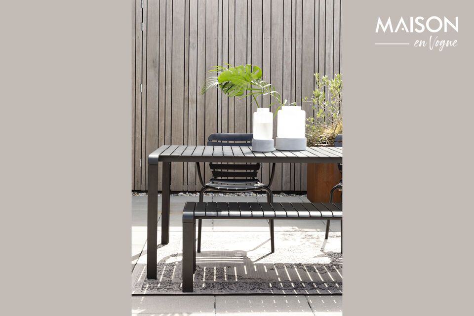 Discover functionality and elegance with our Vondel Black Aluminum Dining Table