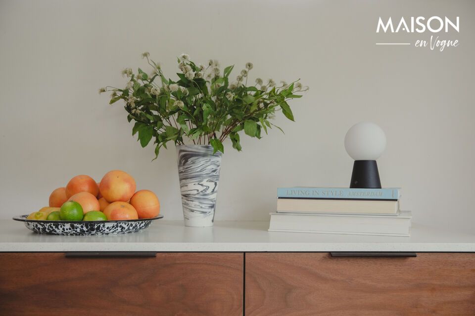 It features a built-in dimmer that lets you adjust the intensity of the light to suit the mood you
