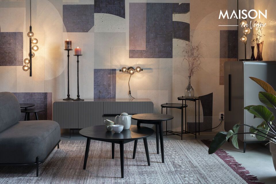 Discover elegance and functionality combined in our new Monica black glass wall light