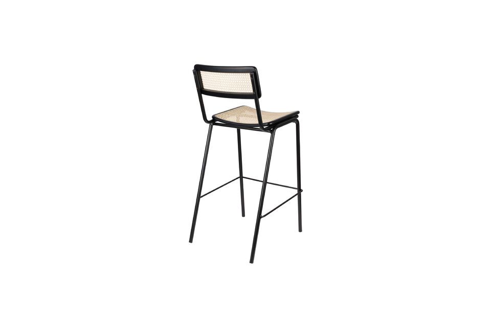 The rattan frame accentuates not only the chair\'s durability