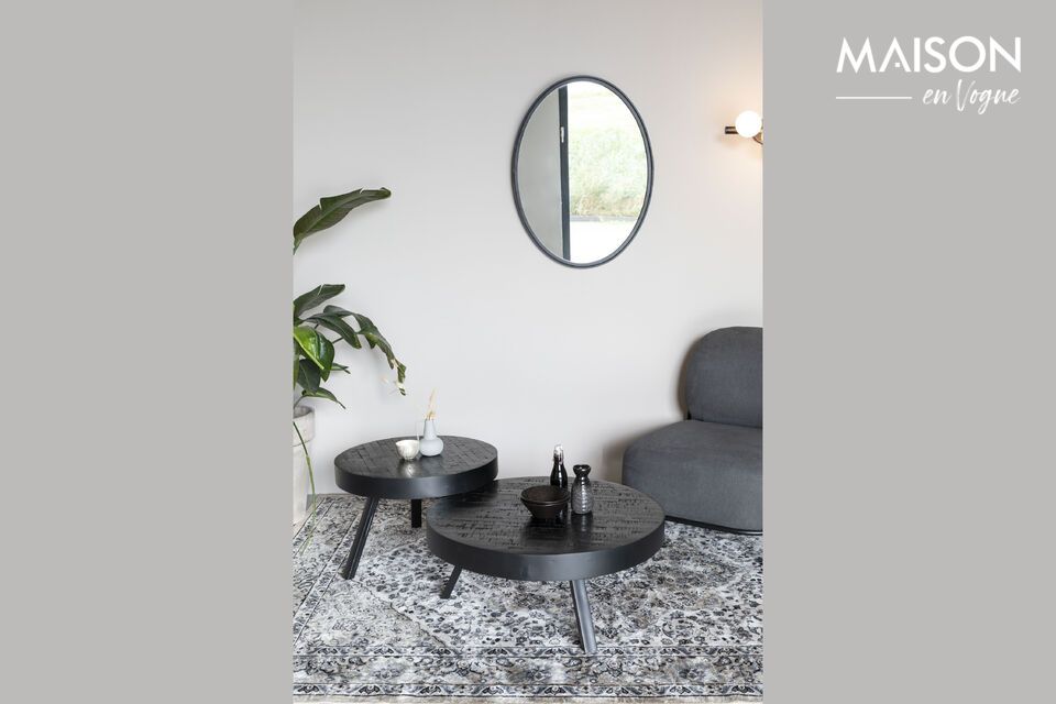 Discover the contemporary charm of our latest collection with the Suri Black Teak Coffee Table