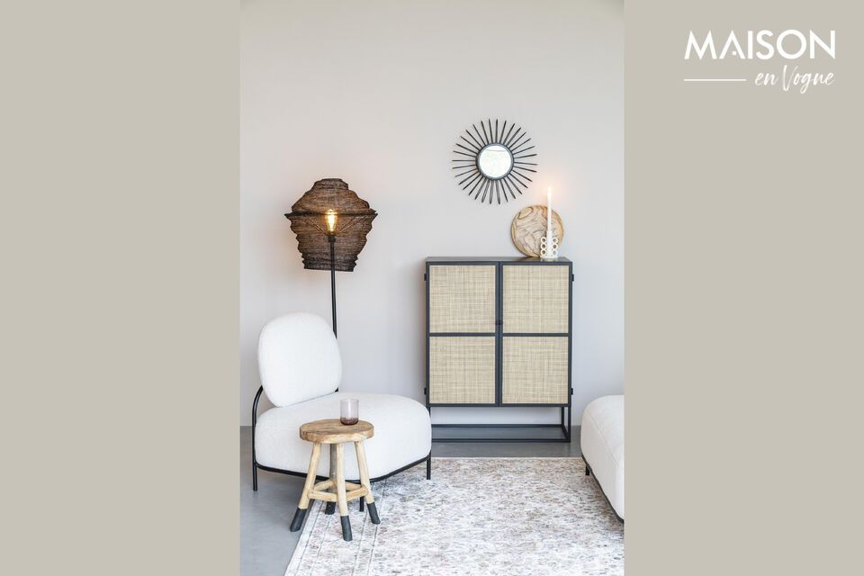 Its doors feature woven rattan surfaces that catch the eye while adding a subtle decorative touch