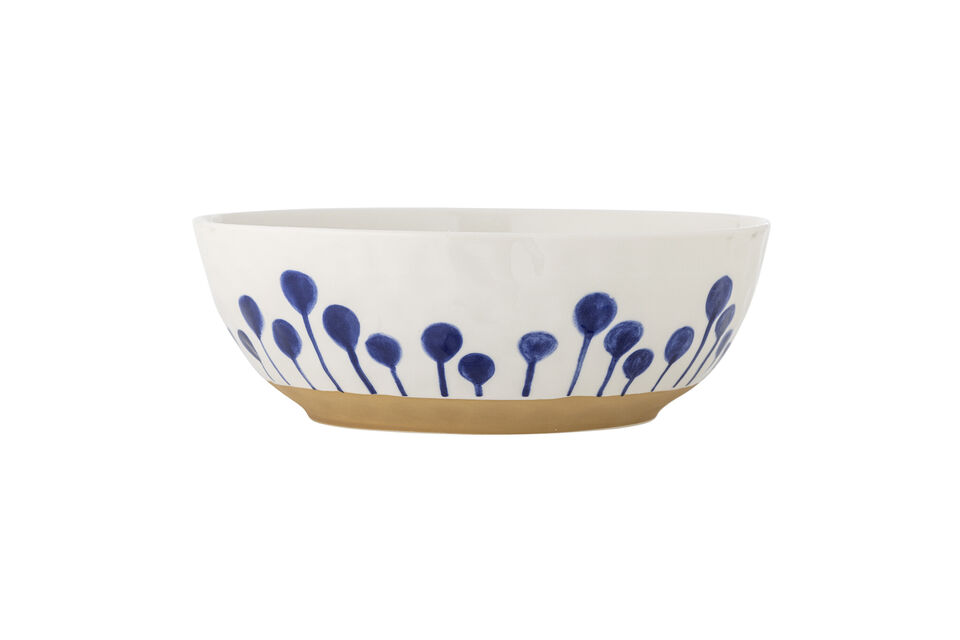 Il présente un fond doux rehaussé d’un motif de pois floraux et une bande mate qui contraste