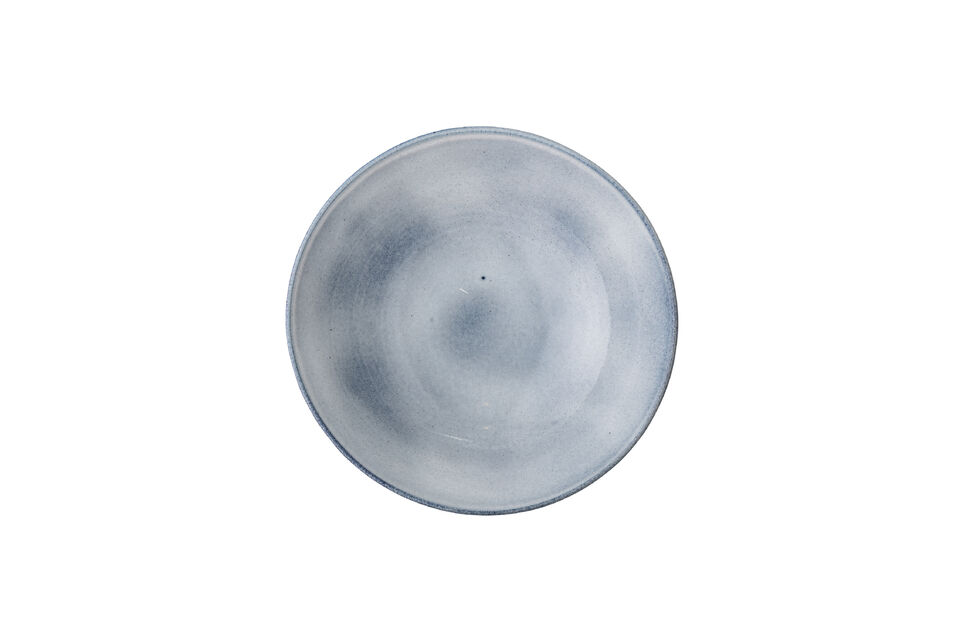 The Sandrine Bowl by Bloomingville is made of stoneware in a deep blue color