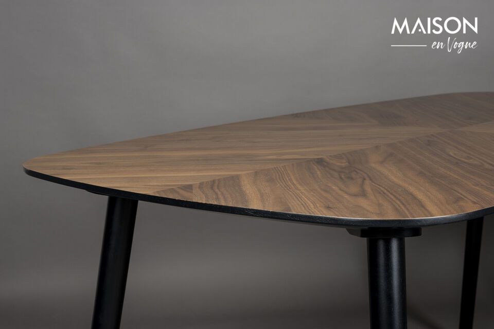 A sturdy, timeless dining table in brown wood.