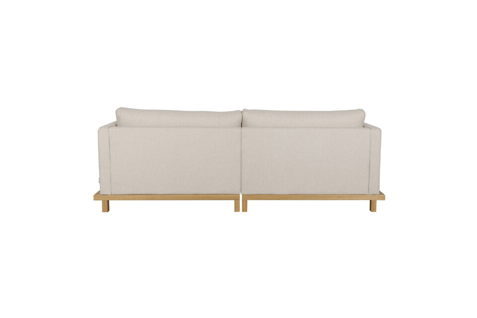 On remarque particulièrement le superbe piètement de ce canapé confortable doté d\'une assise