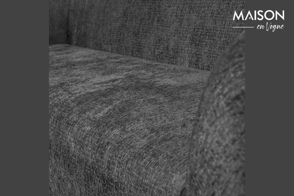 Le design arrondi et épuré confère à ce canapé confortable un look moderne