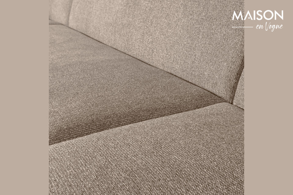 Le design arrondi et épuré confère à ce canapé confortable une allure moderne
