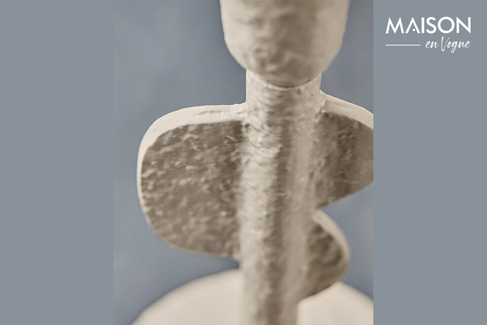 Introduce a touch of artistry to your home décor with this elegant candle holder