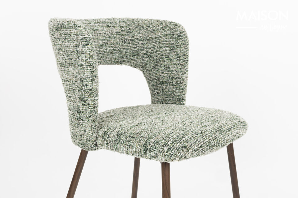 L\'assise est quant à elle revêtue d\'un tissu chiné à tissage grossier