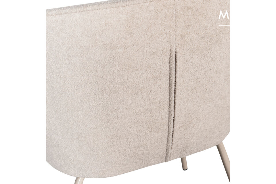L\'assise est recouverte de notre doux tissu tissé Holy