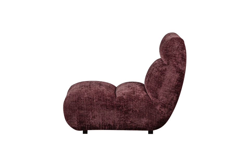 The armchair is a unique specimen because of the coarsely woven chenille with irregular weave