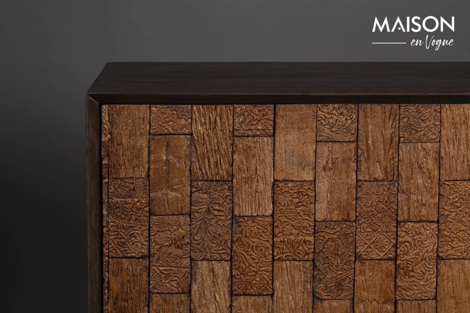 The front is made of two small wooden doors carved in a beautiful marquetry style