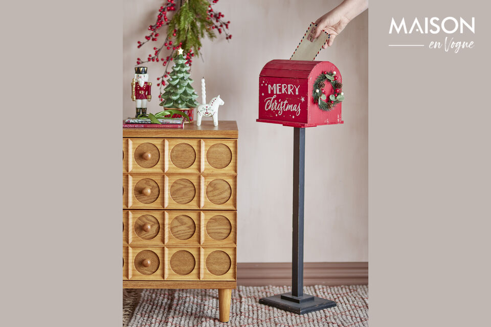 The Carlo Deco by Bloomingville is fashioned as a red postbox with a charming distressed look that