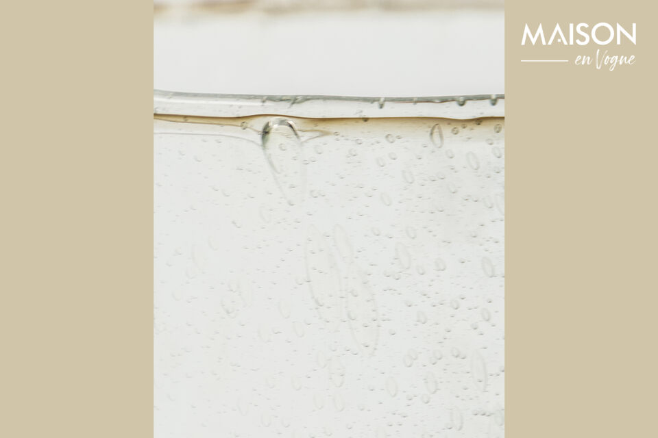 The HDOmay lantern combines the beautifully structured clear glass with an iron top in a silver