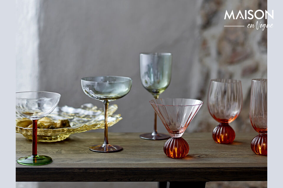 The Signe Cocktail Glass by Bloomingville is a set of six glasses made of glass with a spray colored