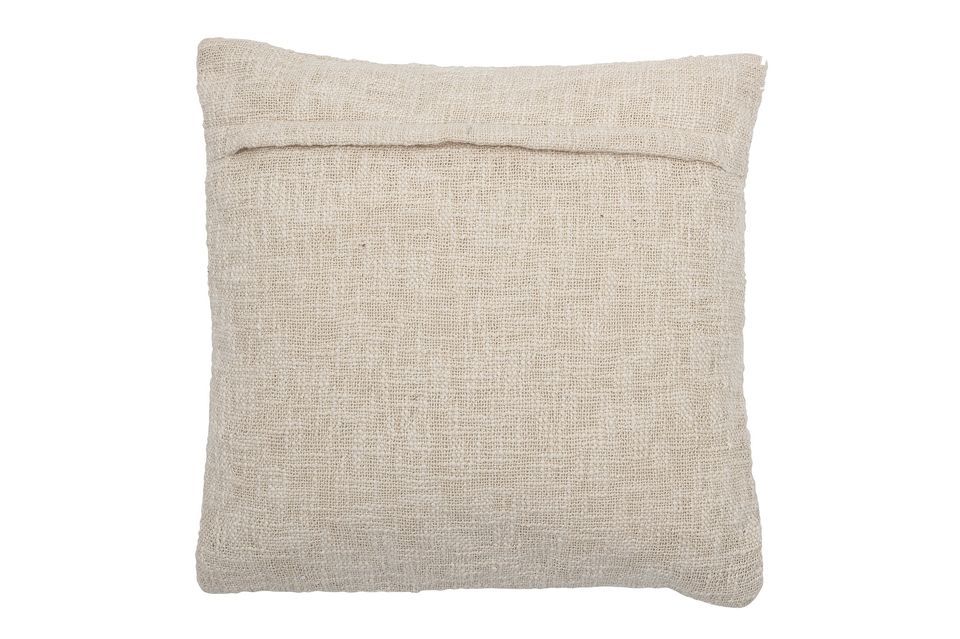 Coussin en coton avec un motif graphique et des couleurs de saison dans une combinaison chaude