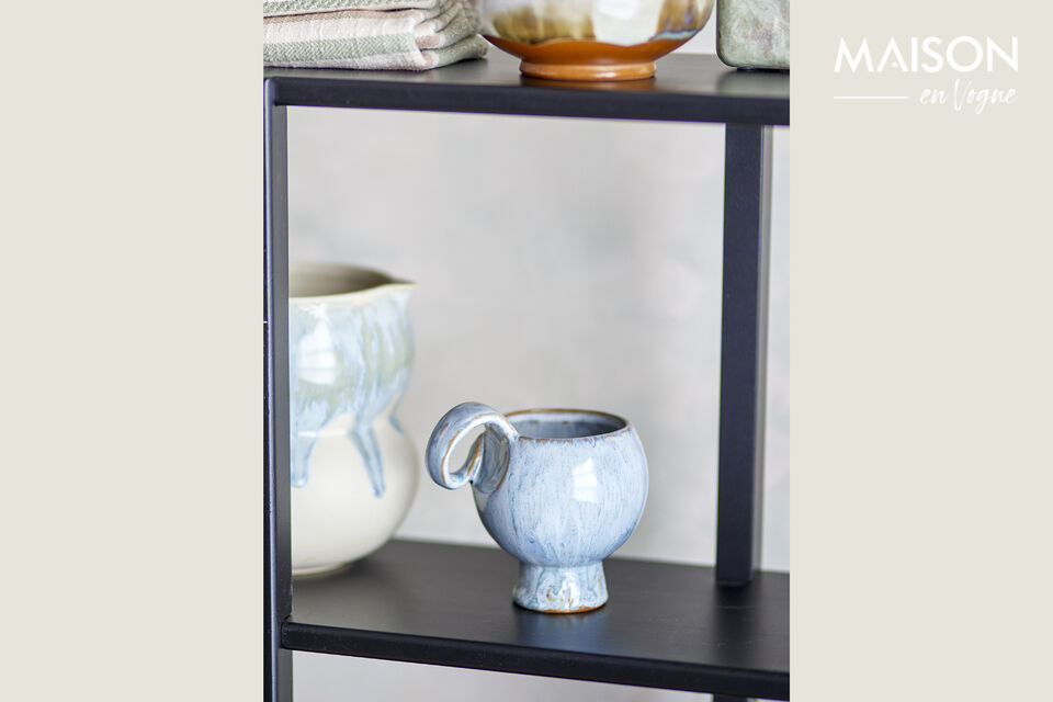 The Avonlea Cup by Bloomingville is made of stoneware with reactive glaze in shades of blue