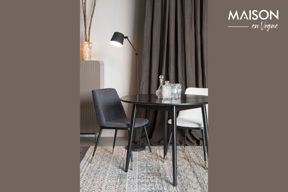 Discover comfort and timeless elegance with our Lionel chair in dark gray fabric