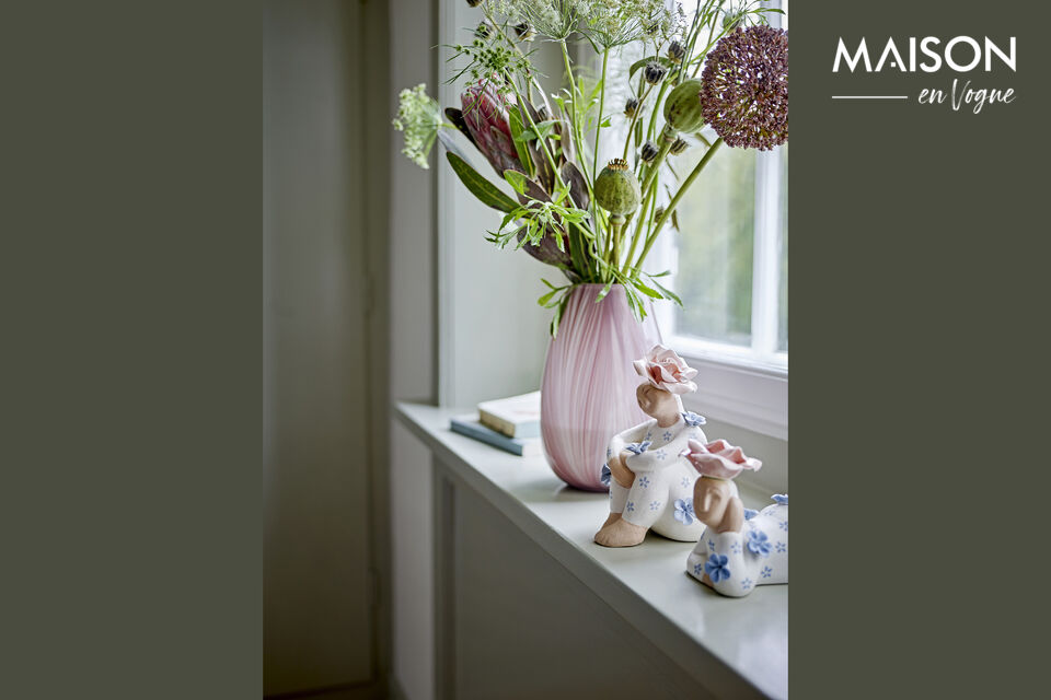 The Floriella Deco by Bloomingville is a set of two charming figurines that add a playful touch to