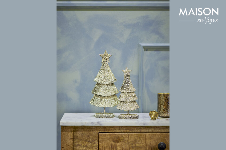 The Radha Deco Tree by Bloomingville is a set of two decorations in a gold tone shaped like trees