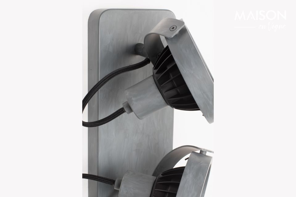 The Dice-2 spotlight in galvanized metal produces a warm light