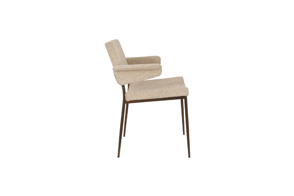 This dining chair is designed with striking armrests that are attached to the backrest and resemble