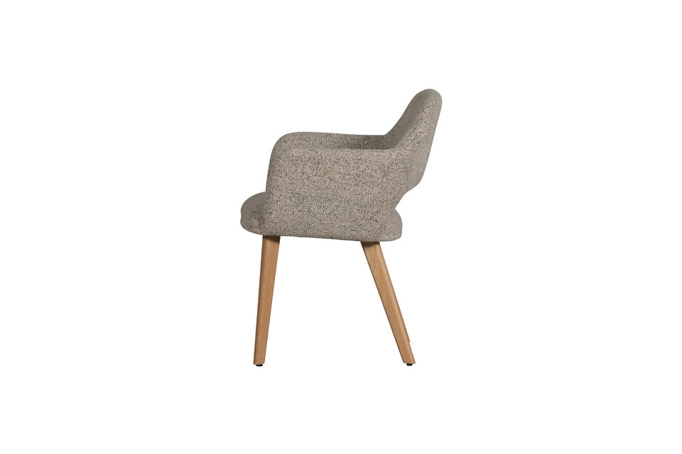 This dining chair is upholstered with a woven fabric of 100% polyester