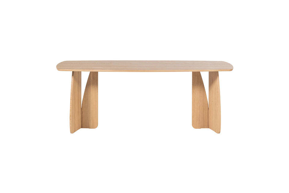 Due to the Danish oval tabletop in combination with the sculptural look of the legs