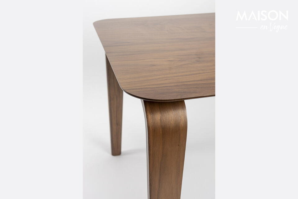 The furniture is designed with curved wooden legs