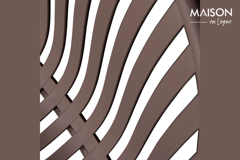 Le fauteuil et le repose-pieds Bruce proviennent de la collection outdoor de la marque
