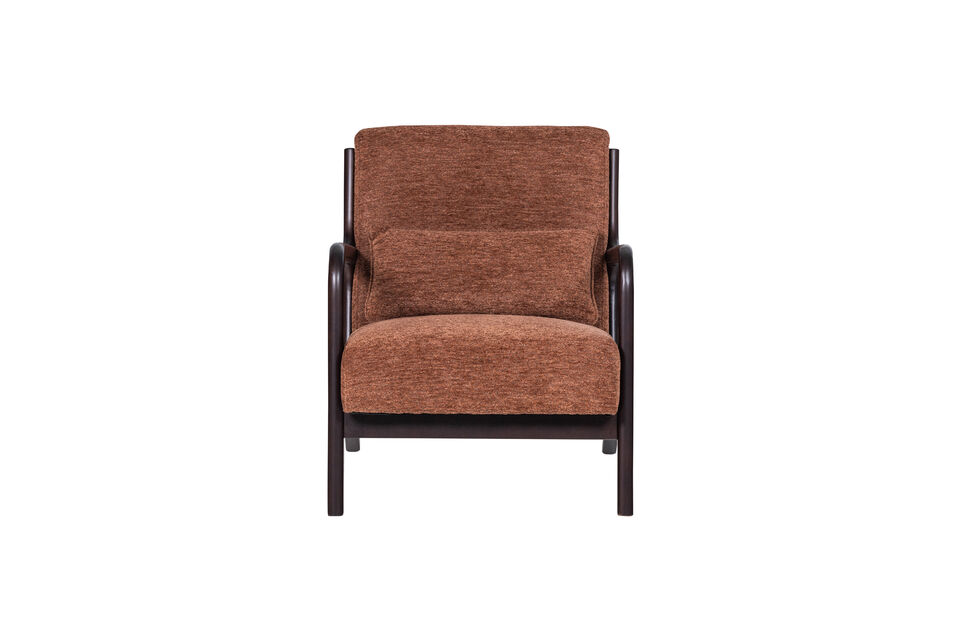 Ce fauteuil présente un look rétro avec des coins doucement arrondis qui créent une atmosphère