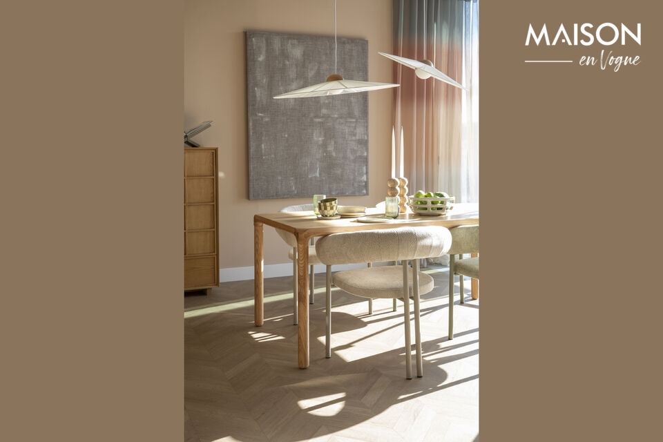 Ce fauteuil et cette chaise de salle à manger ont une allure si accueillante que vous devrez