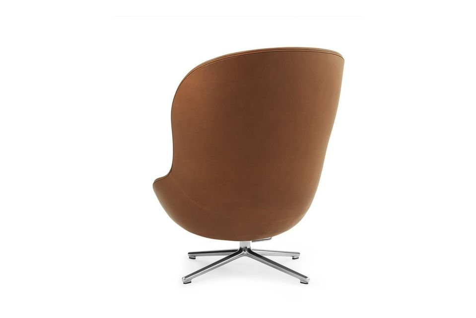 Ce fauteuil rotatif confortable est recouvert de cuir marron de qualité pour vous procurer un