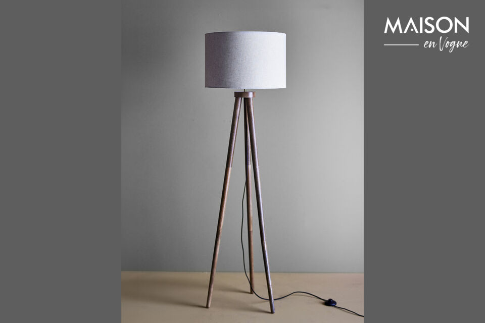 The Etienne Floor Lamp by Creative Collection is made of mango wood with a walnut stained