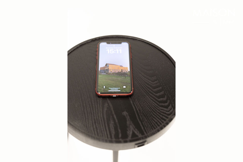 The appeal of Zuiver’s Orion Charge floor lamp lies in its wireless charging station and opal